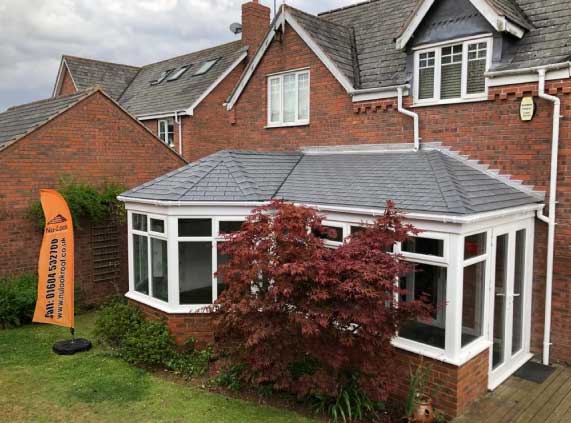 an after shot of a conservatory tiled roof