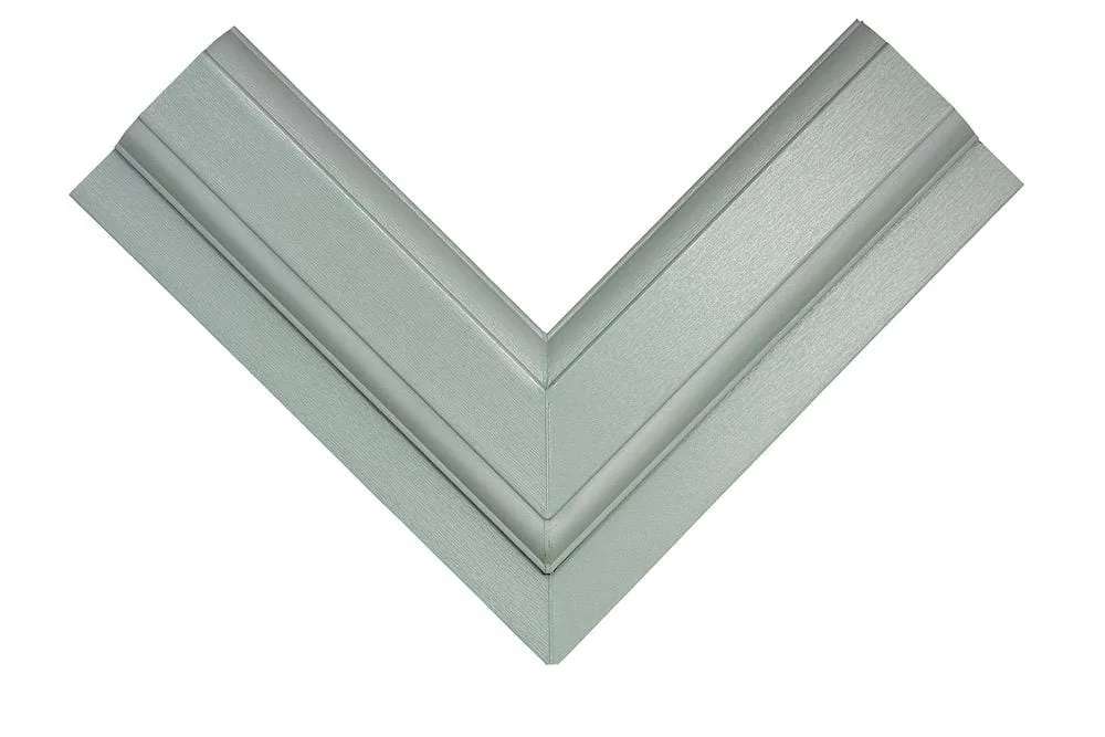 Close-up of a window frame corner section in Chartwell Green finish, showing the woodgrain texture and mitred joint detail.