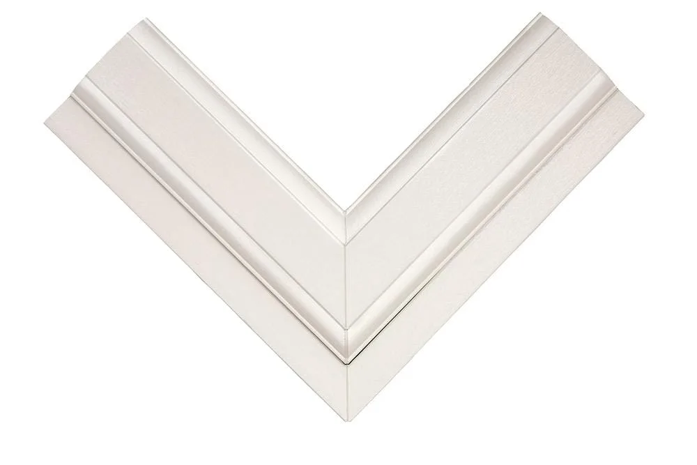 Close-up of a window frame corner joint in Cream Woodgrain finish, showing the stepped profile detail.