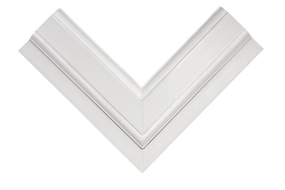 Close-up of a white uPVC window frame corner joint showing the mitred profile detail